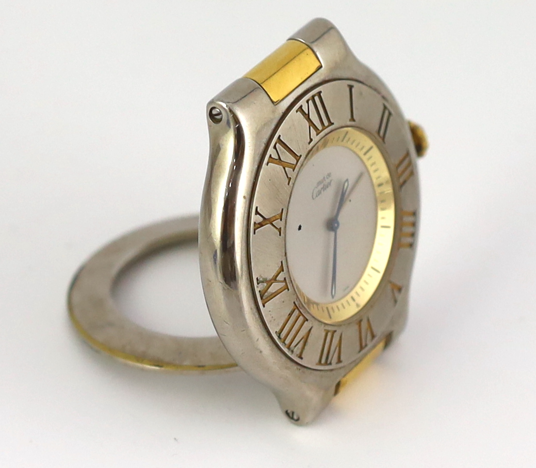 A modern Must de Cartier steel and gold plated quartz travelling timepiece